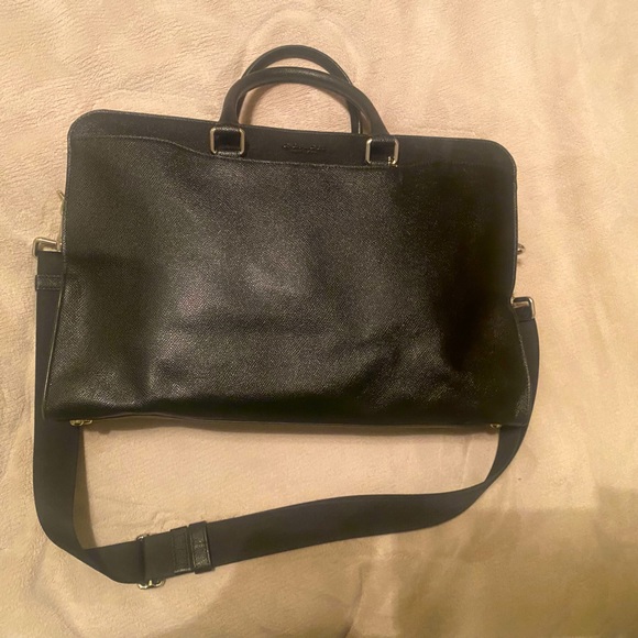 Coach briefcase. Posed w/purse pillow to demonstrate shape. Used once. No marks. - Picture 2 of 7